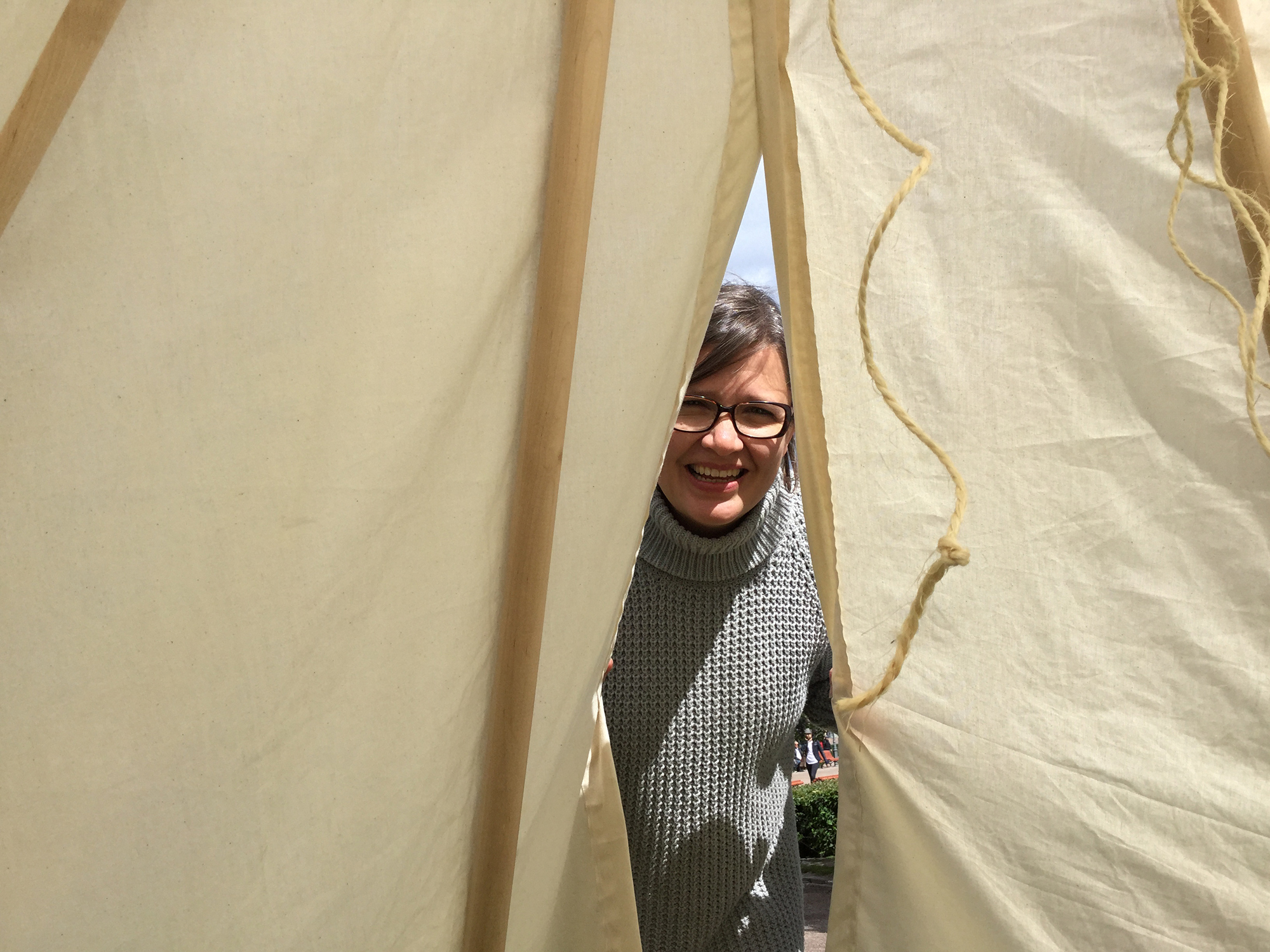 Jaana peeking from a teepee