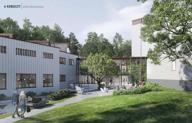 Havainnekuva vaaleasta rakennuksesta puistossa