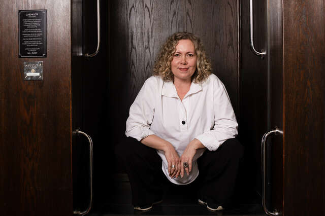 A woman looking at the camera