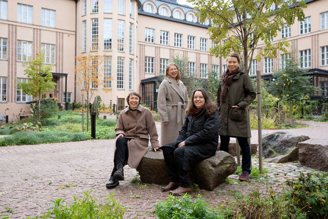Four women portraying