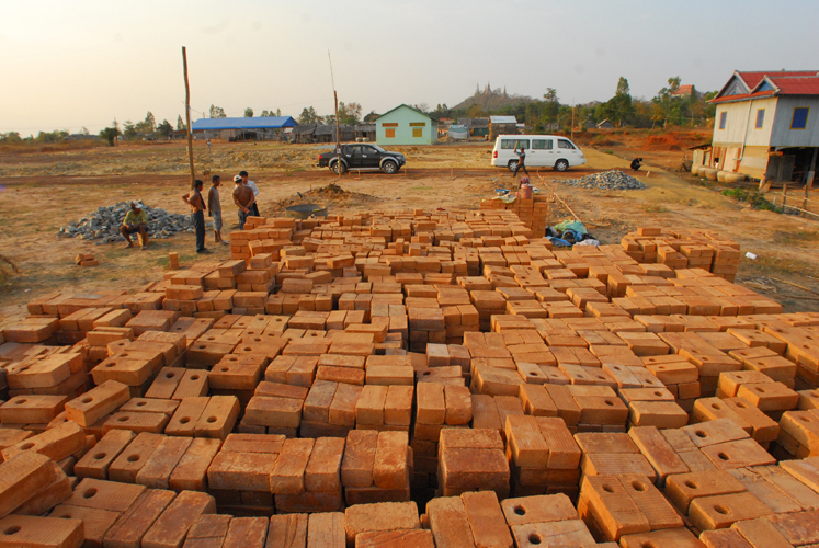 Making sun-dried bricks. Sra Pou Vocational School in Cambodia (Architects Rudanko + Kankkunen, 2010–2012). Photo: Anssi Kankkunen.
