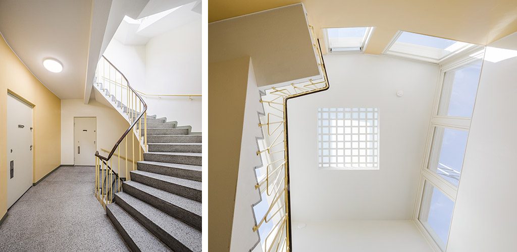 Restored staircases with natural light shining in. 